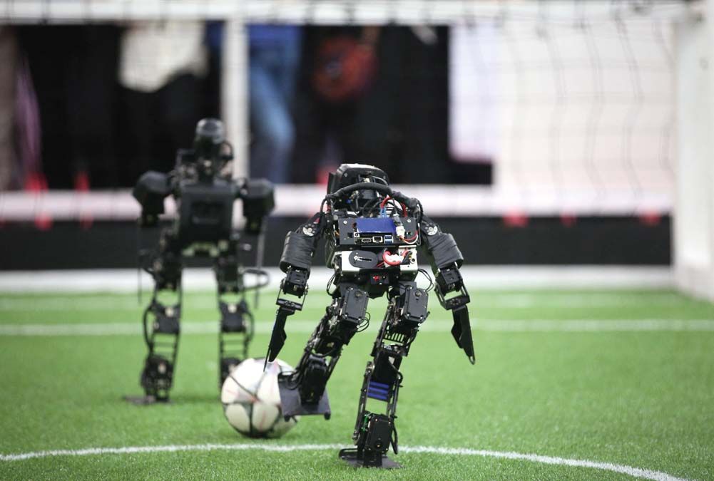 Robotok fociznak a 13. nemzetközi RoboCupon 2018. április 6-án. <br> Fotó: AFP / Fatemeh Bahrami / ANADOLU AGENCY 