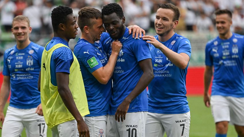 Krisztian Lisztes of Ferencvarosi TC celebrates with teammates after