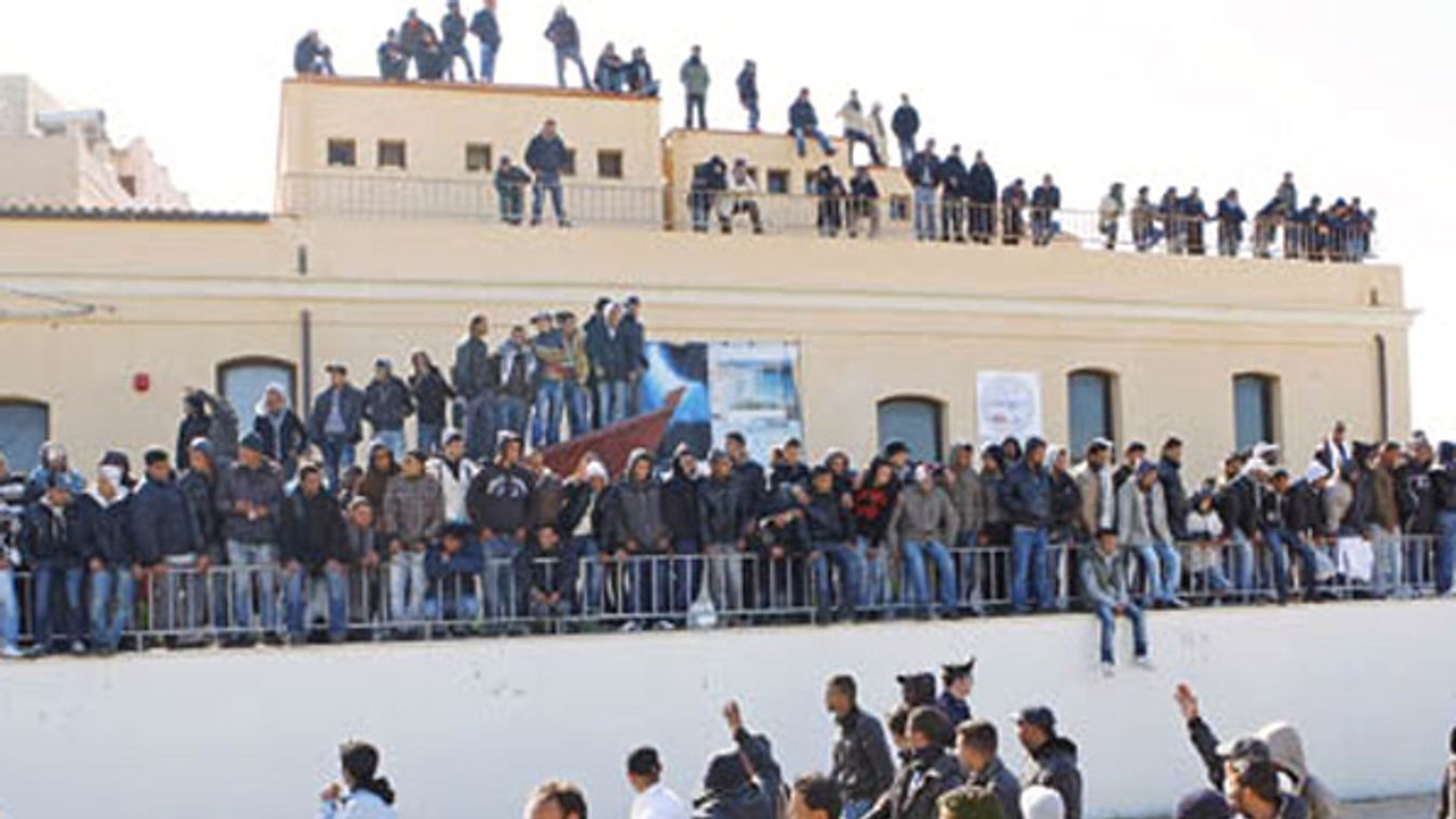 Illegal immigrants from North Africa arrive on the southern Italian island of Lampedusa