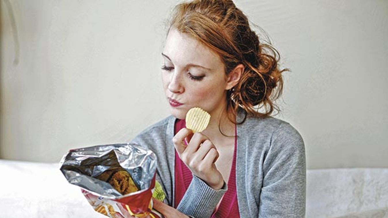 WOMAN SNACKING