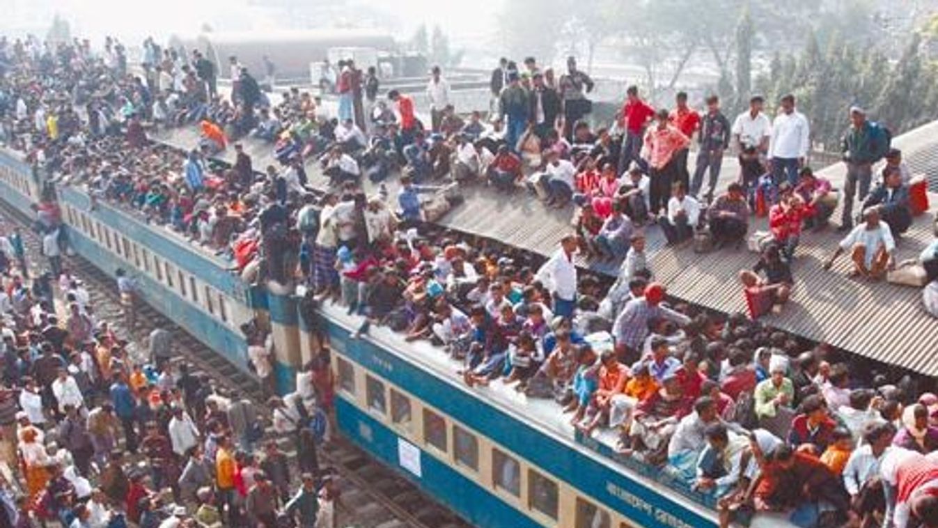 An overcrowded train leaves Dhaka's Airport rail station ahead of the Muslim festival Eid-al-Adha