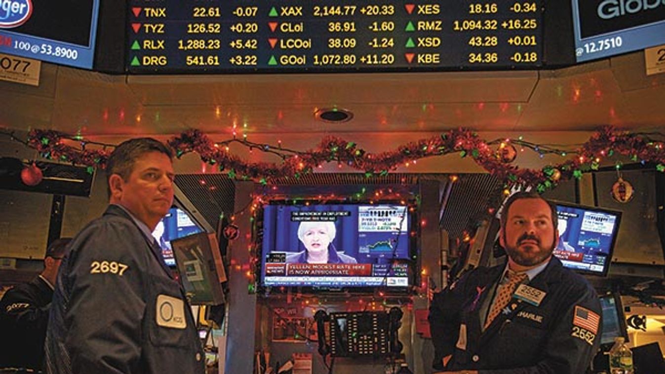 Traders On The Floor Of The NYSE As FOMC Announces Rate Decision