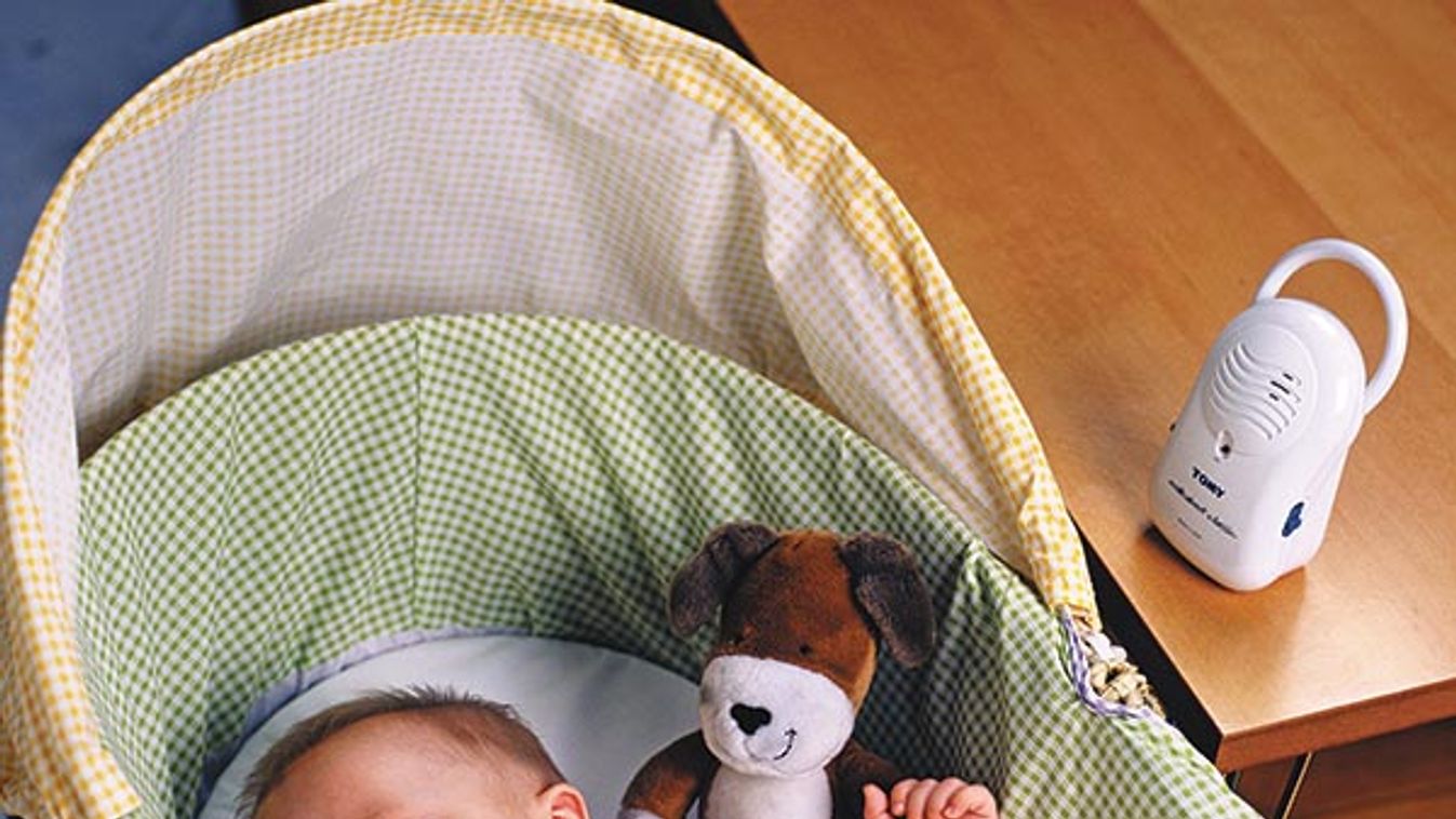 Sleeping baby with monitor