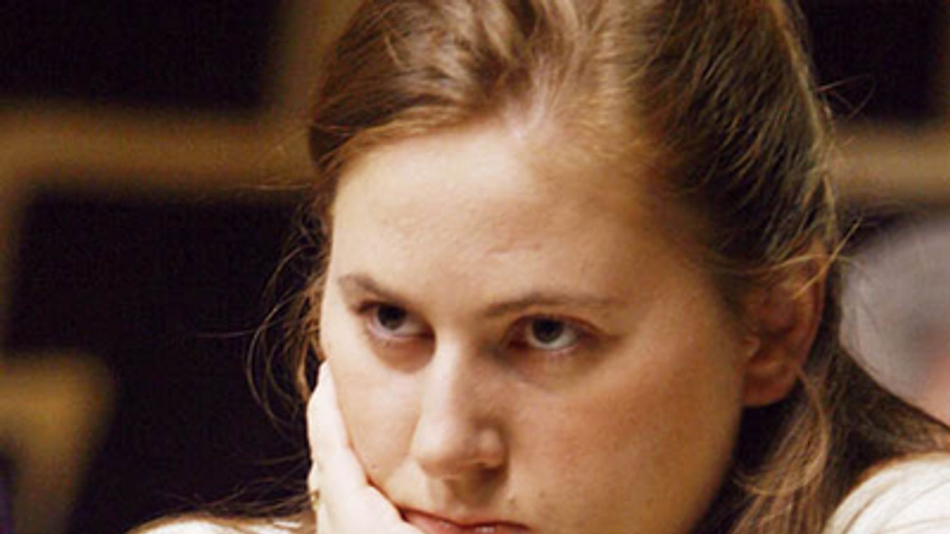 Chess player Judit Polgar of Hungary looks at her rival Alexander Morozevich of Russia