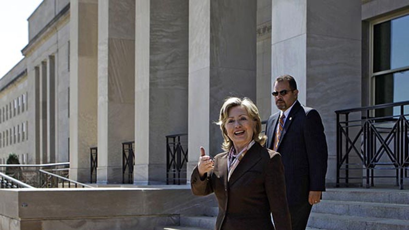 U.S. Secretary of State Hillary Clinton walks out from the Pentagon in Washington after attending a news briefing on the new Nuclear Posture Review