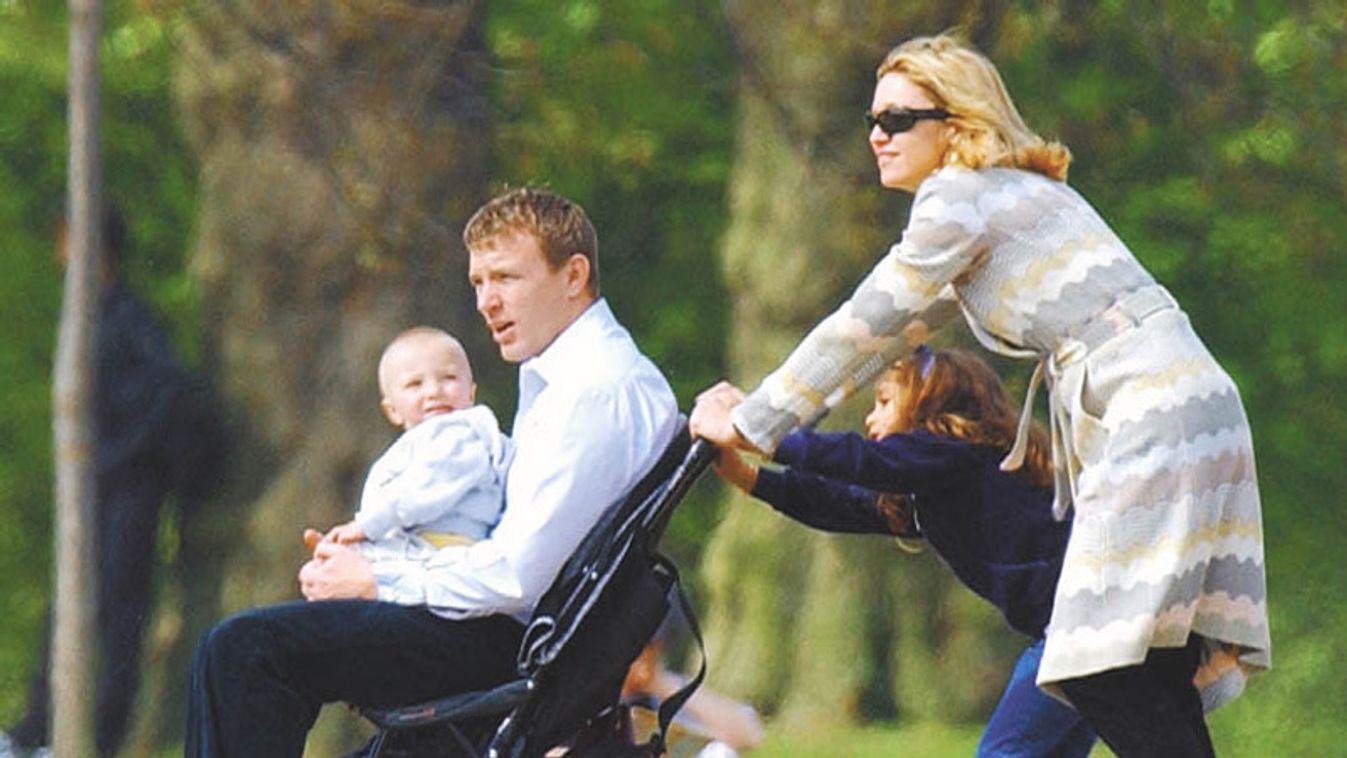 (File Photo) Madonna and Family Walk In The Park