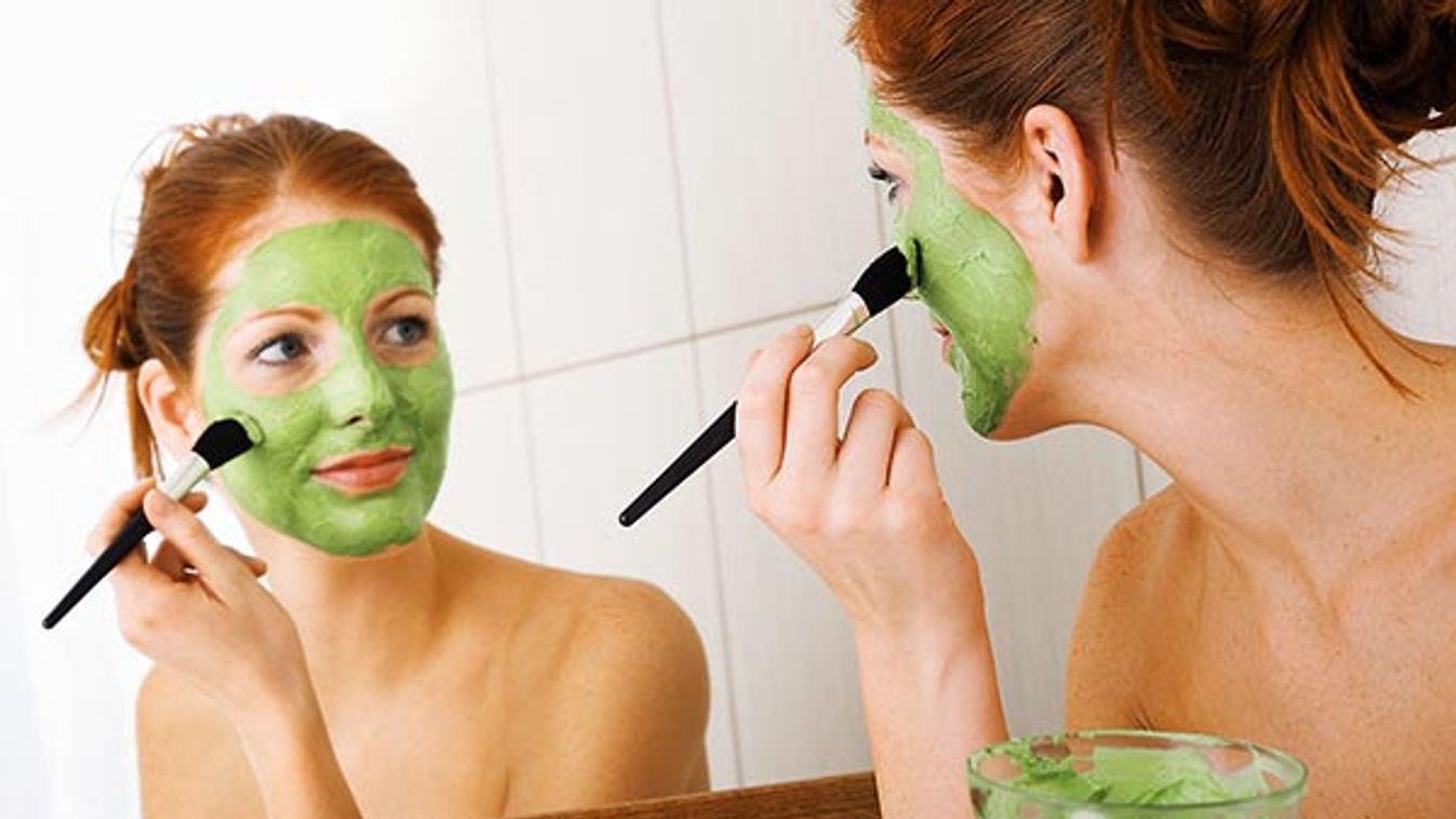 Body care - young woman with facial mask