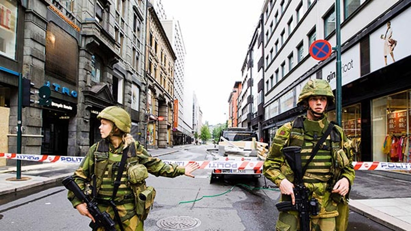 Soldiers guard near a cordoned area in Oslo