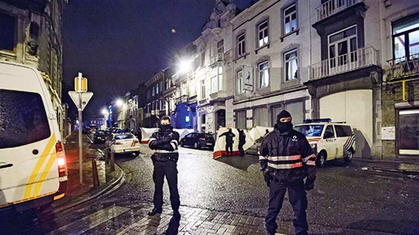 Belgian police block a street in central Verviers where Belgian counter-terrorist police raided an apartment