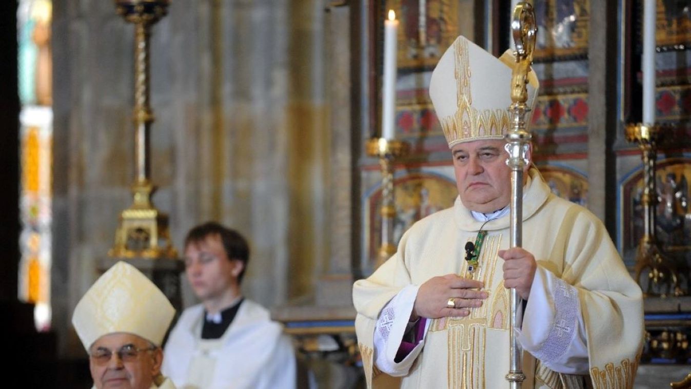 Czech Cardinal and former head of Czech Republic's Roman Catholic Church Miroslav Vlk (l) and new head of Czech Republic's Roman Catholic Church and 36th Archbishop of Prague Dominik Duka (r) attend the inauguration mass for gthe latter at the St. Vitus Cathedral in Prague on April 10. 