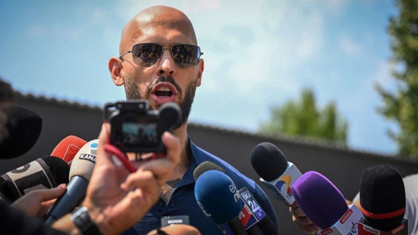 British-US former professional kickboxer and controversial influencer Andrew Tate addresses the media in the front of his home in Bucharest, August 4, 2023, after a Romanian court lifted a house arrest order on him and his brother who will now be placed under judicial control as they await trial on human trafficking charges. 