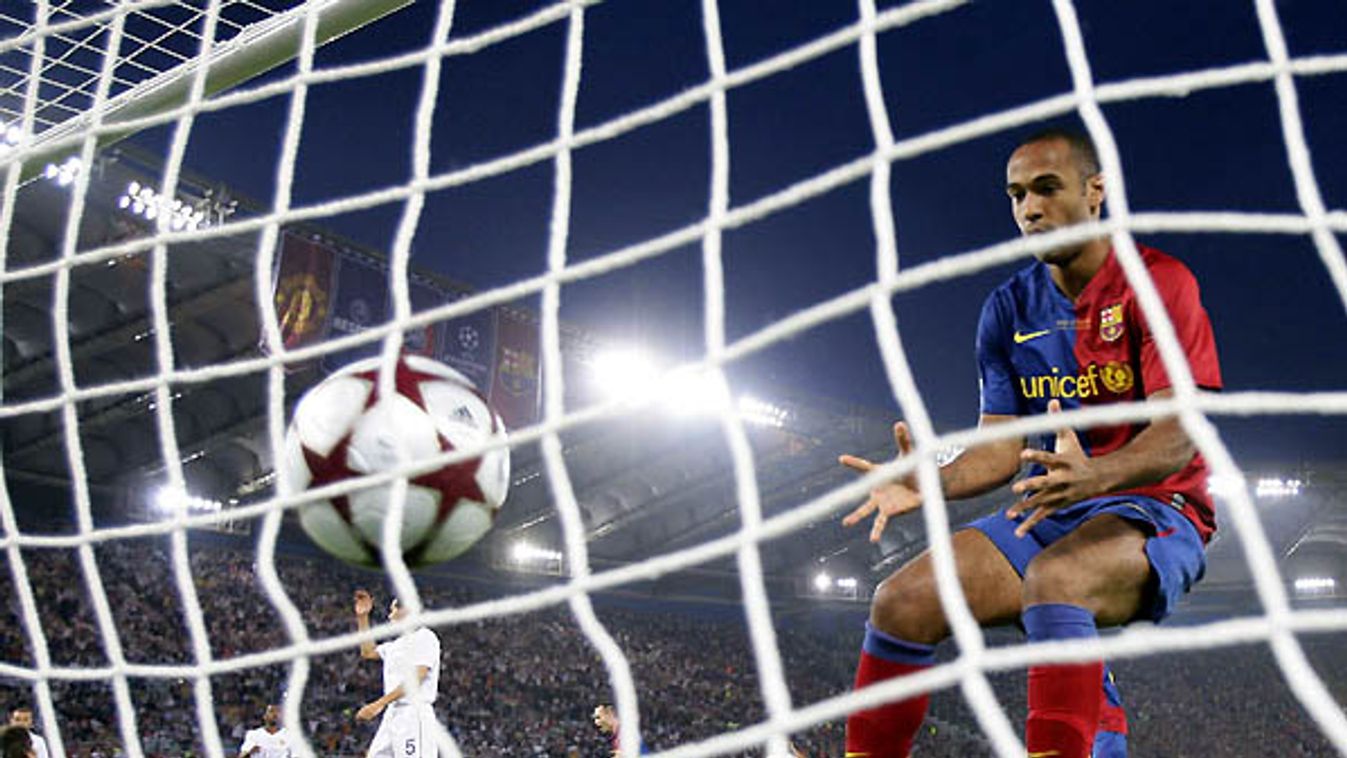 Barcelona's Henry reacts after Eto'o scored during Champions League final against Manchester United at the Stadio Olympico in Rome