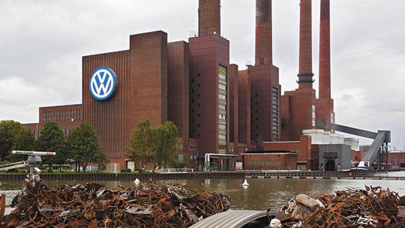 Scrap metal lies in a boat in front of the Volkswagen power plant in Wolfsburg