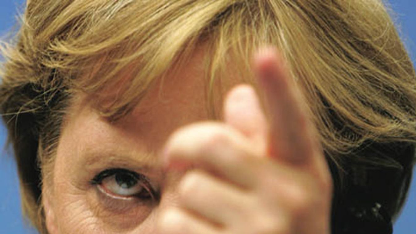 Germany's Chancellor Merkel addresses a news conference at the end of a EU heads of state summit in Brussels