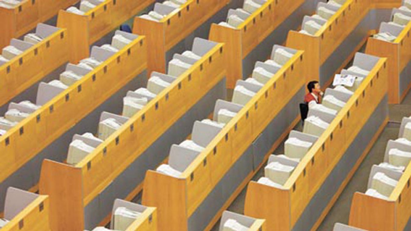 Trader is seen at trading hall of Shanghai Stock Exchange in Shanghai