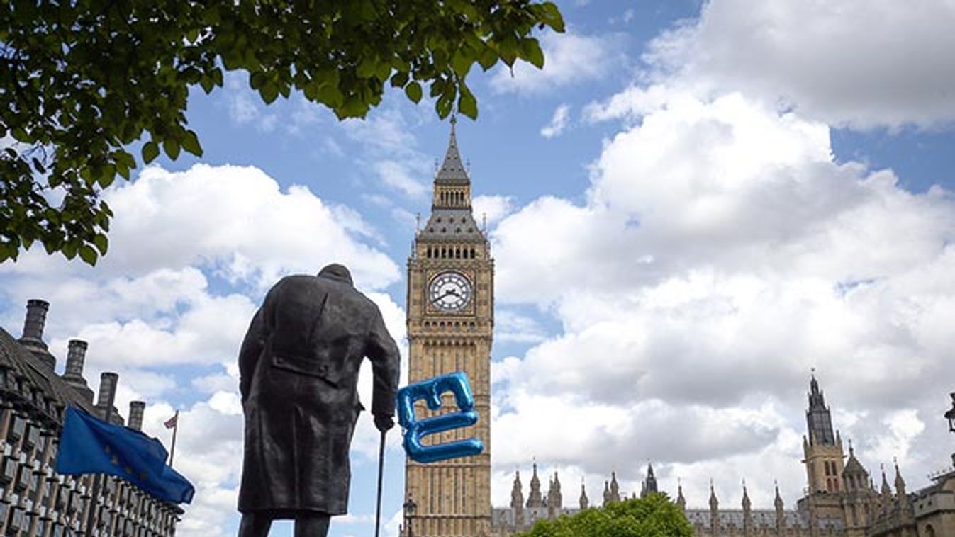 A balloon is tied to the Winston Churchill statue in Parliament Square during a demonstration against Britain's decision to leave the European Union, in central London