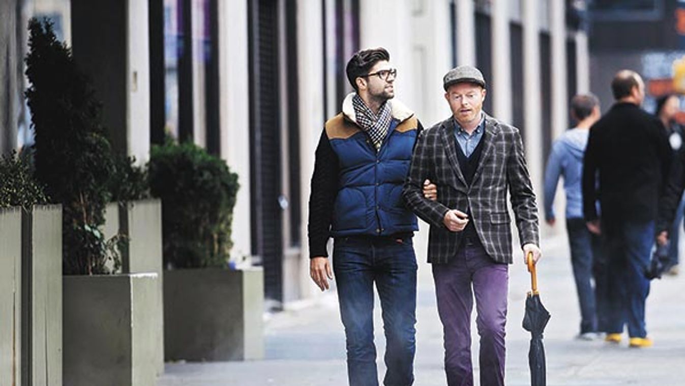 Actor Jesse Tyler Ferguson spotted holding partner Justin Mikita tight in the SoHo neighborhood of NYC