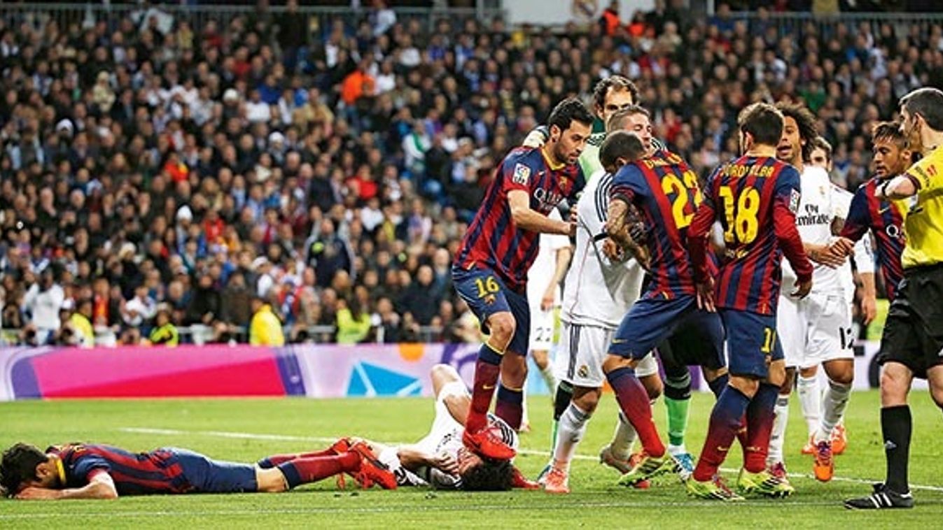 Barcelona's Busquets steps on Real Madrid's Pepe after Lionel Messi's goal against Real Madrid during La Liga's second 'Clasico' soccer match of the season in Madrid