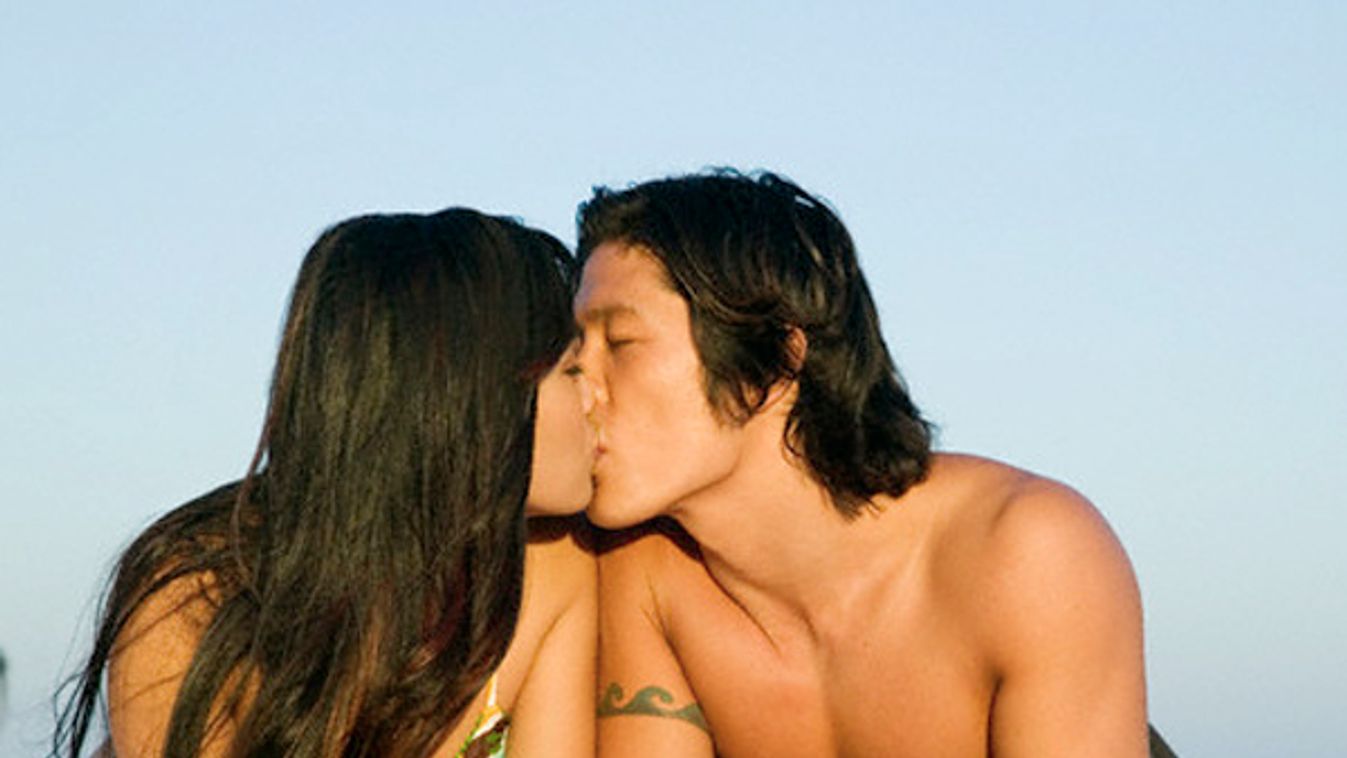 Young Asian Couple Kissing