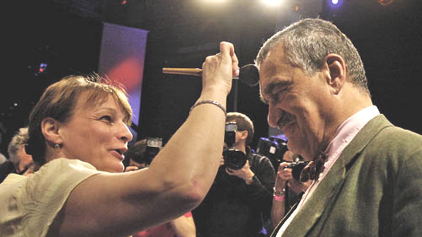 TOP09 Party chairman Schwarzenberg has makeup put on before a TV debate in Prague