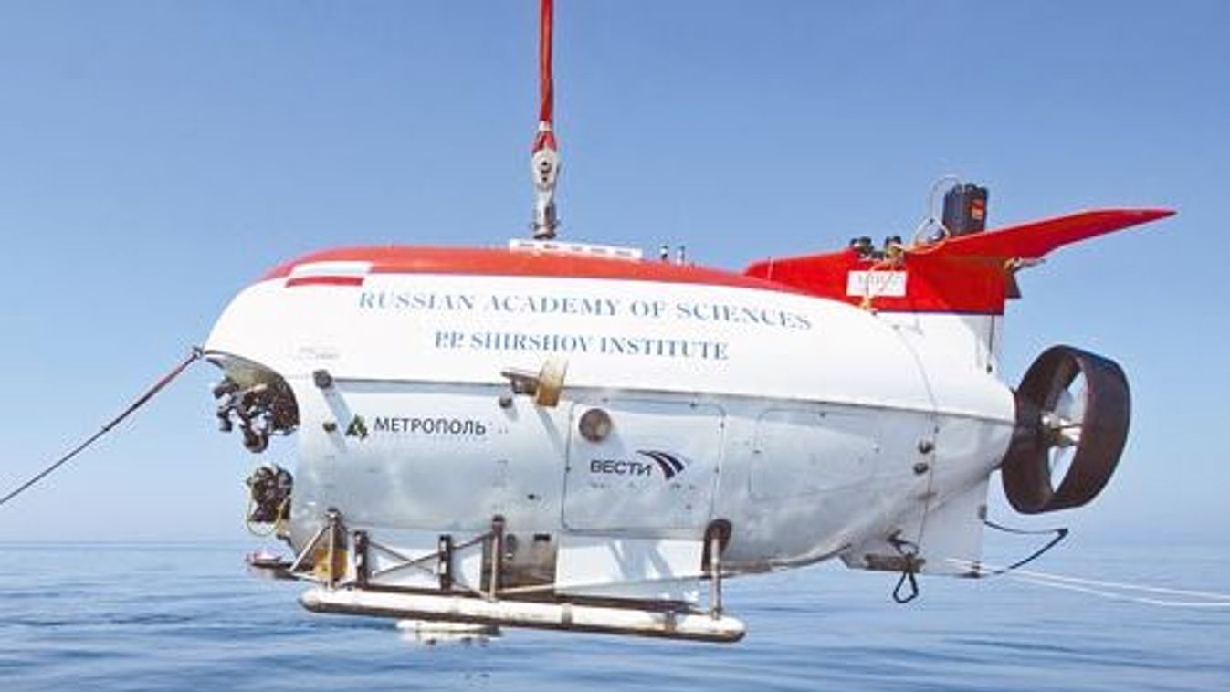 The MIR-2 submarine is lowered into the waters of Siberia's Lake Baikal during a test-run of a diving expedition