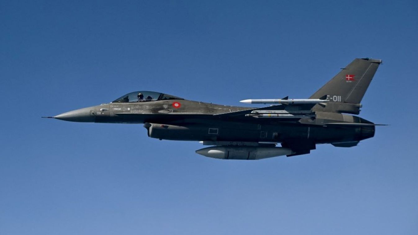 A Royal Danish Air Force F-16 jetfighter takes part in the NATO exercise as part of the NATO Air Policing mission, in Alliance members’ sovereign airspace on July 4, 2023.