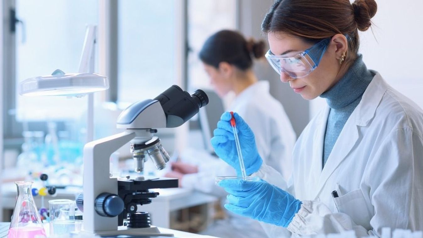 Young,Female,Student,In,The,Research,Lab,,She,Is,Examining