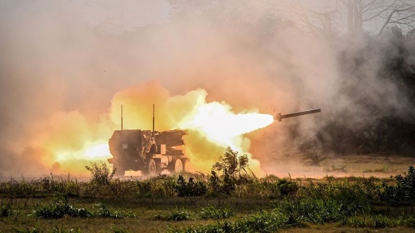 Members of the US army launch the M142 High Mobility Artillery Rocket Systems (HIMARS) during the Super Garuda Shield 2023 joint military exercise including Indonesia, Japan, Singapore, Australia and the US in Situbondo, East Java on September 11, 2023.