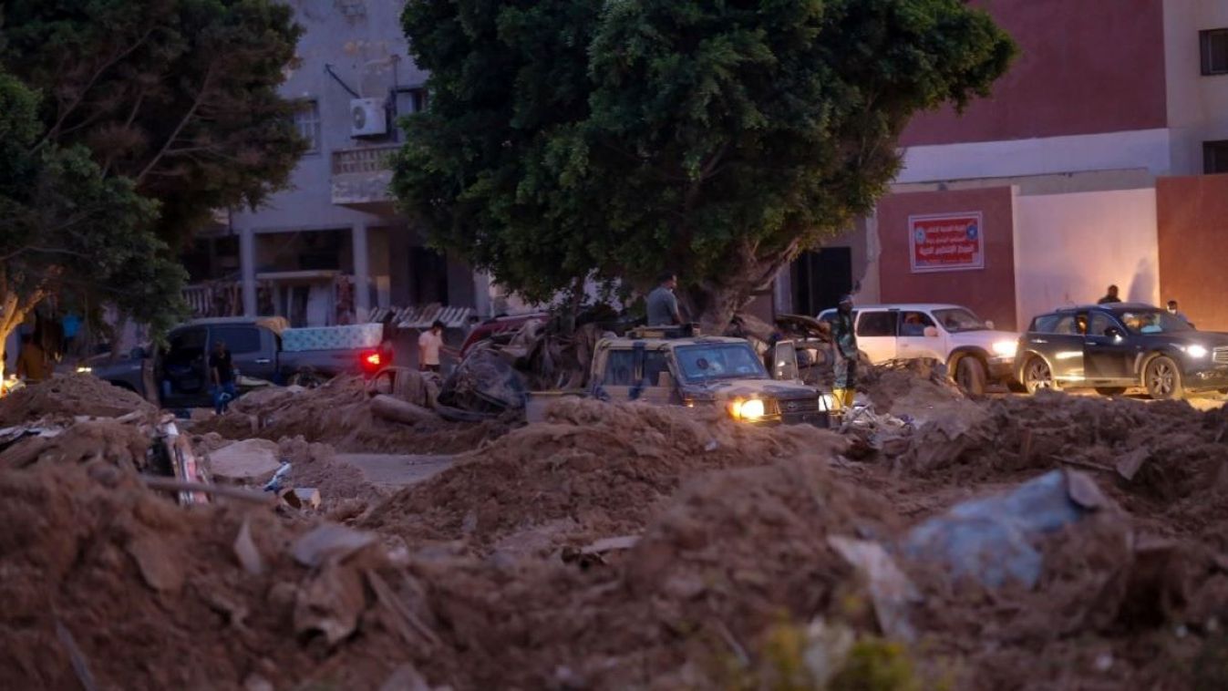  Rescue teams are assisting in relief efforts in the eastern Libyan city of Derna on September 18, 2023, following deadly flash floods. A week after a tsunami-sized flash flood devastated the coastal city, sweeping thousands to their deaths, the international aid effort to assist the grieving survivors is slowly gaining momentum.