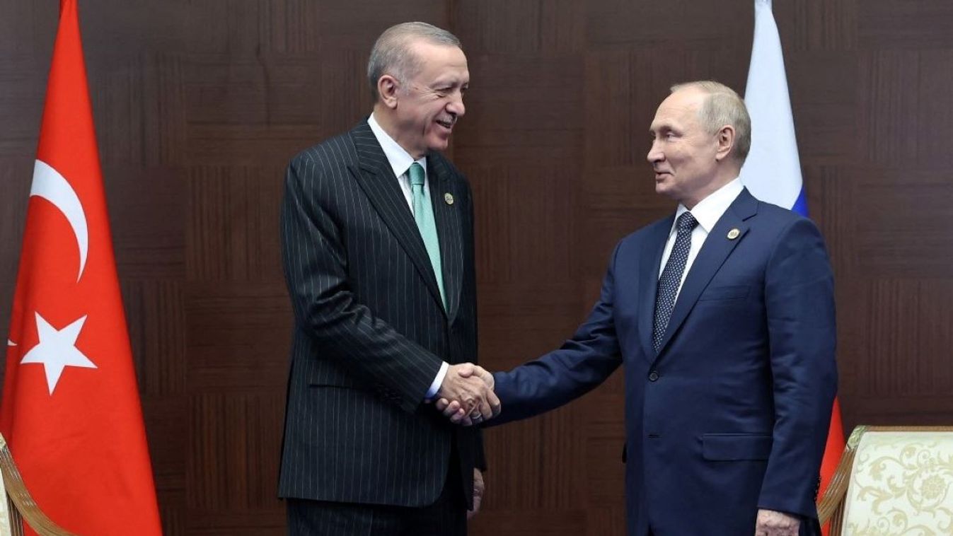 Turkish President Recep Tayyip Erdogan (L) meets Russian President Vladimir Putin on the sidelines of the Conference on Interaction and Confidence Building Measures in Asia (CICA) in Astana, on October 13, 2022.