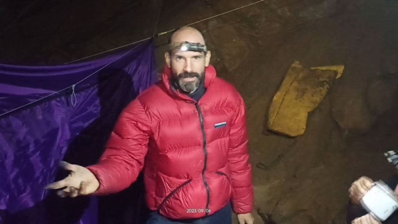 This video grab taken from footage released by The Turkish Direction of Communication on September 8, 2023, shows US caver Mark Dickey as he speaks to the camera while standing at a camp in the Morca Cave of the Taurus Mountains in southern Turkey. A US explorer trapped deep in a Turkish cave with internal bleeding said in a video released to AFP on Friday that he needed "a lot of help" getting out.