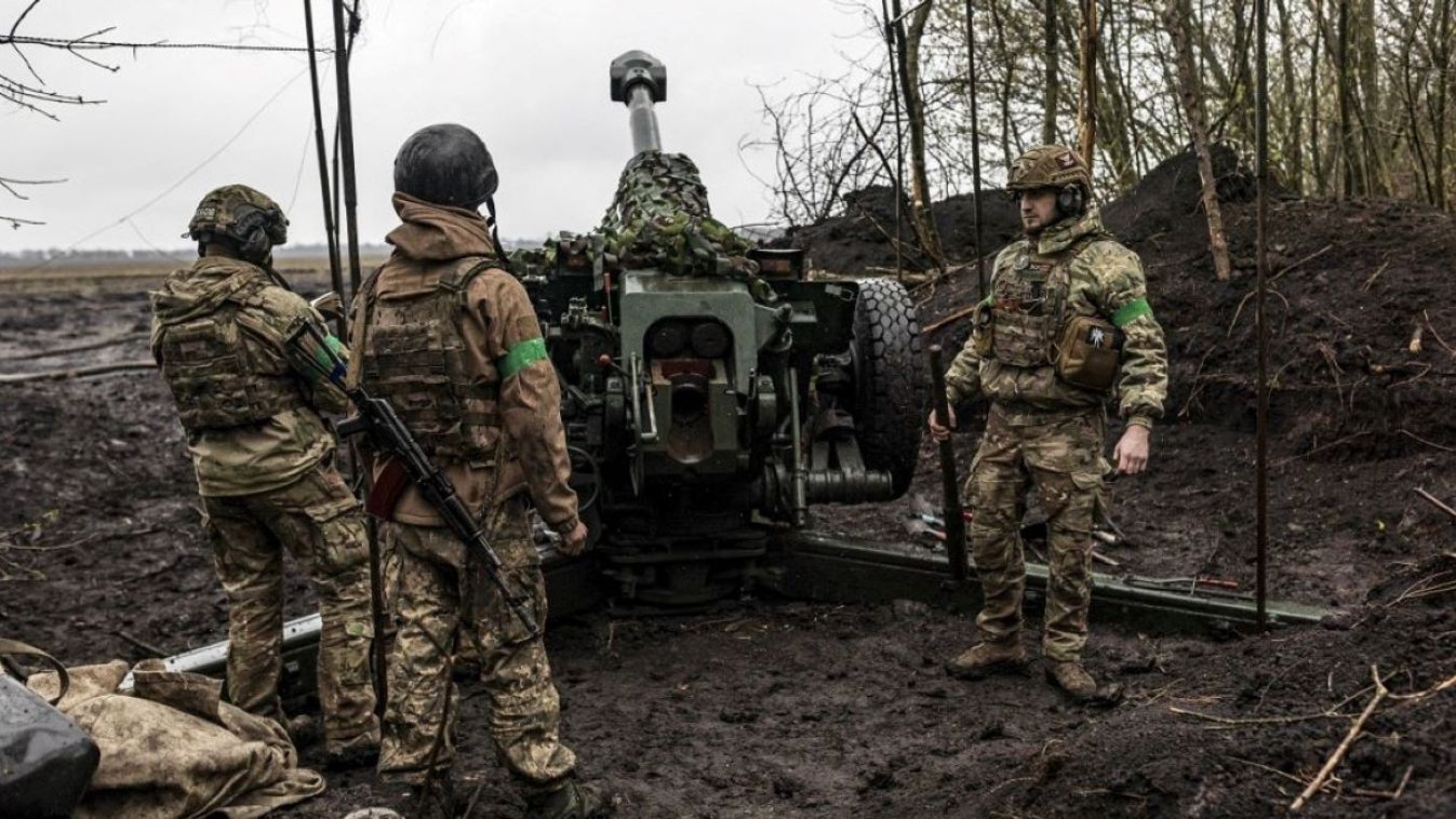 Ukrainian soldiers of the 80th brigade, preparing artillery for firing in the direction of Bakhmut, on April 13, 2023 as Russian-Ukrainian war continues.