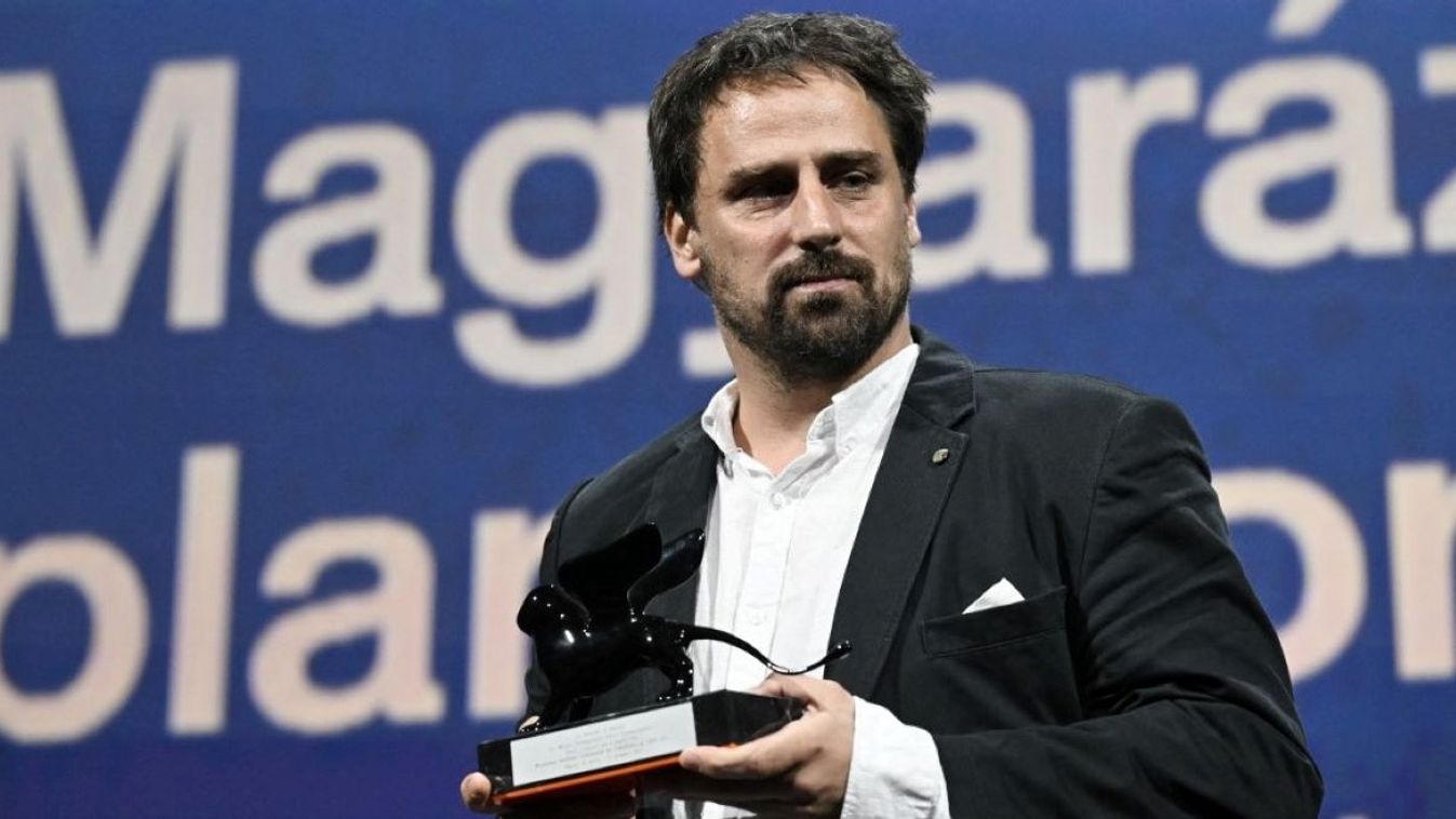 Director Gabor Reisz poses with the Orizzonti Award for Best Film he received for Magyarazat Mindenre (Explanation for Everything) during the award ceremony of the 80th Venice Film Festival on September 9, 2023 at Venice Lido.