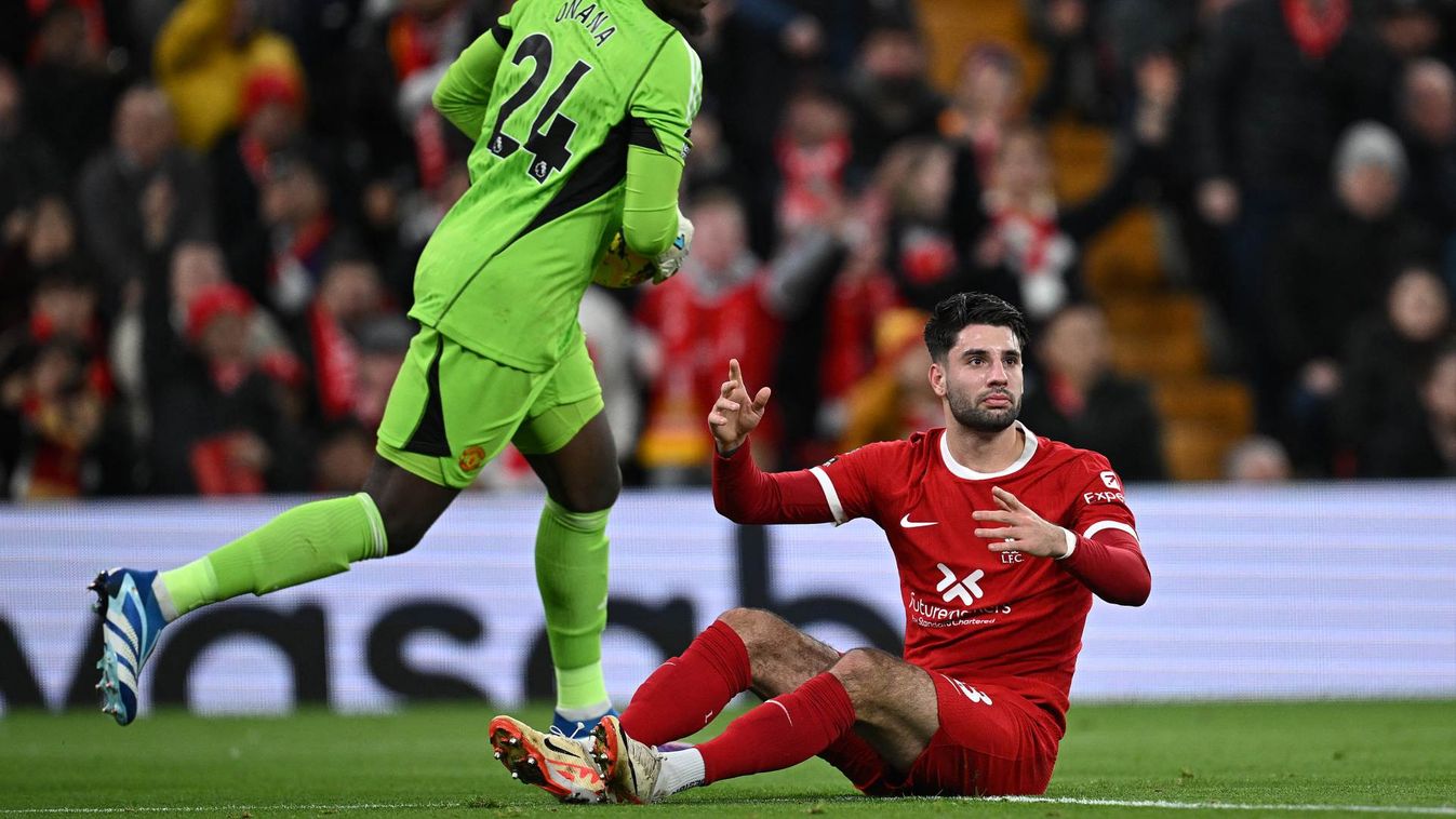 Liverpool's Hungarian midfielder #08 Dominik Szoboszlai unsuccessfully appeals for a penalty during the English Premier League football match between Liverpool and Manchester United at Anfield in Liverpool, north west England on December 17, 2023.