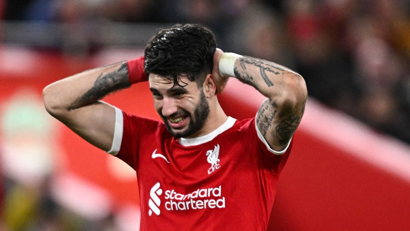 Liverpool's Hungarian midfielder #08 Dominik Szoboszlai reacts after missing to score during the English Premier League football match between Liverpool and Arsenal at Anfield in Liverpool, north west England on December 23, 2023. (Photo by Paul ELLIS / AFP)