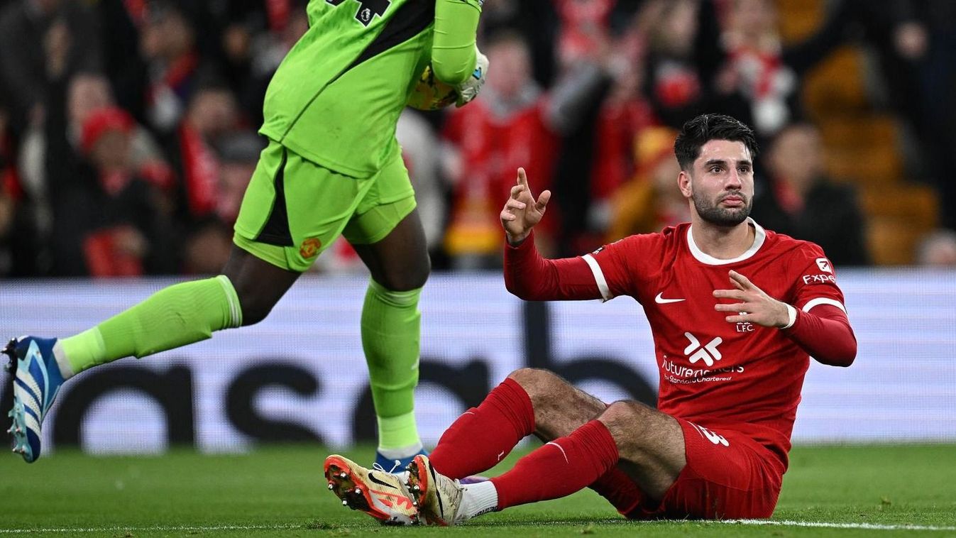Liverpool's Hungarian midfielder #08 Dominik Szoboszlai unsuccessfully appeals for a penalty during the English Premier League football match between Liverpool and Manchester United at Anfield in Liverpool, north west England on December 17, 2023.