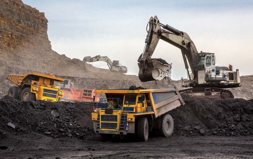 Loading,Of,Coal,Into,Truck.,Excavator,At,Work,.,Mining