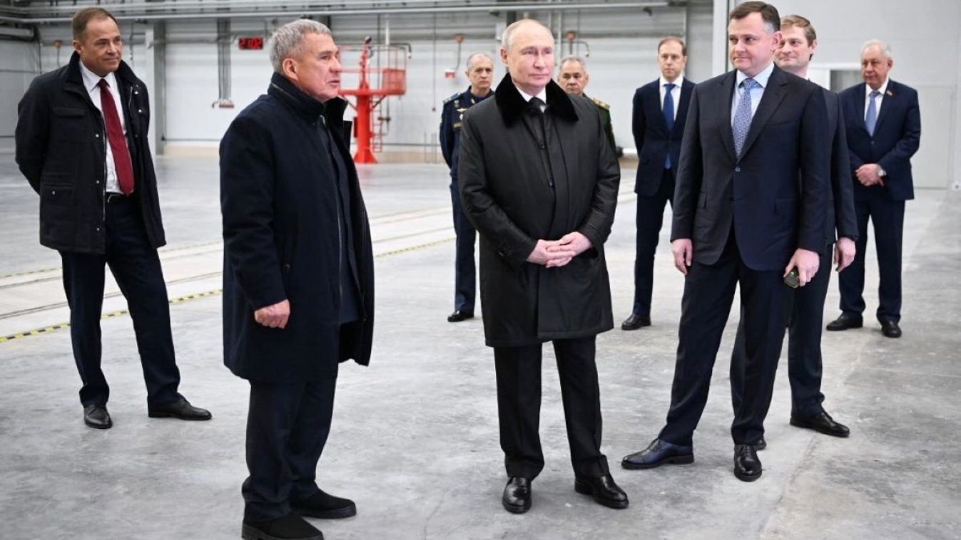 In this pool photograph distributed by Russian state agency Sputnik, Russia's President Vladimir Putin visits the Gorbunov Kazan Aviation Plant in Kazan on February 21, 2024.