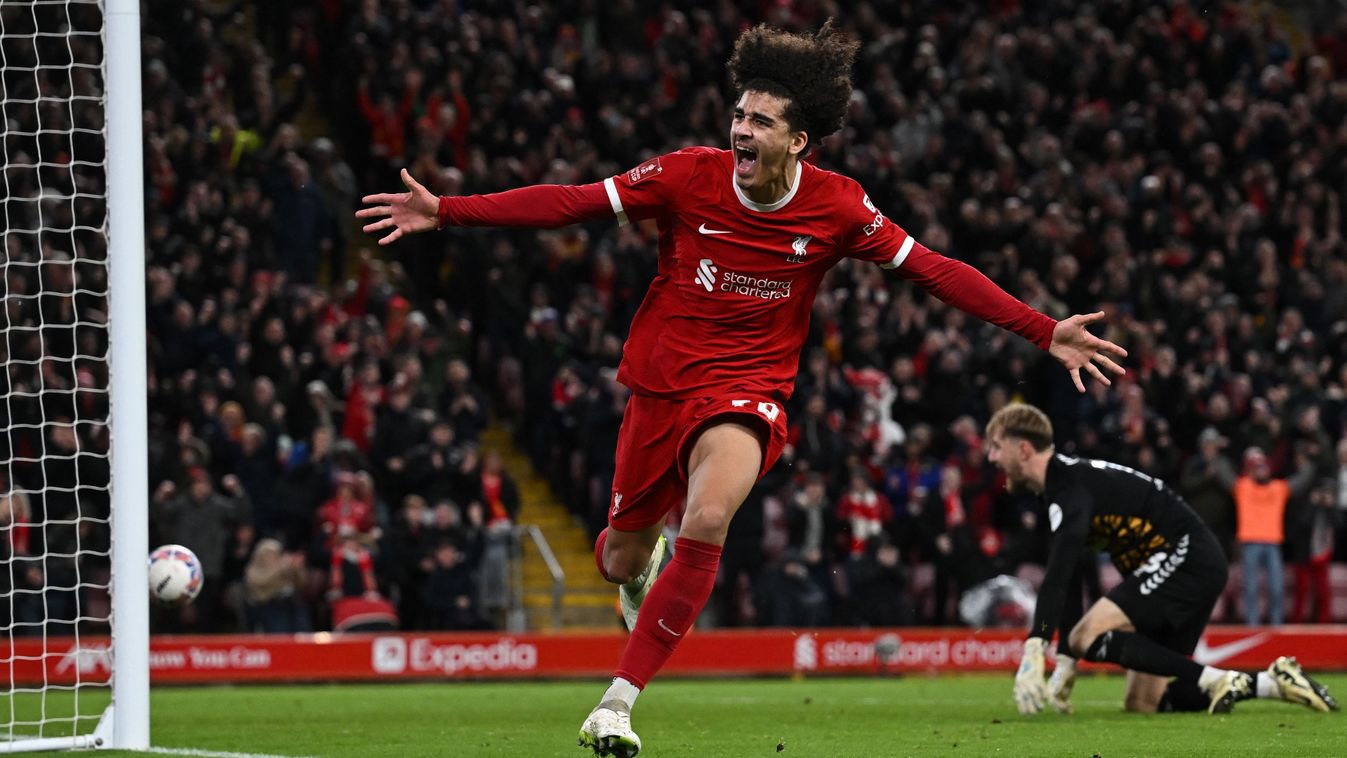776106050Liverpool's English striker #76 Jayden Danns celebrates after scoring their third goal during the English FA Cup fifth round football match between Liverpool and Southampton at Anfield stadium, in Liverpool, north west England, on February 28, 2024. (Photo by Paul ELLIS / AFP)