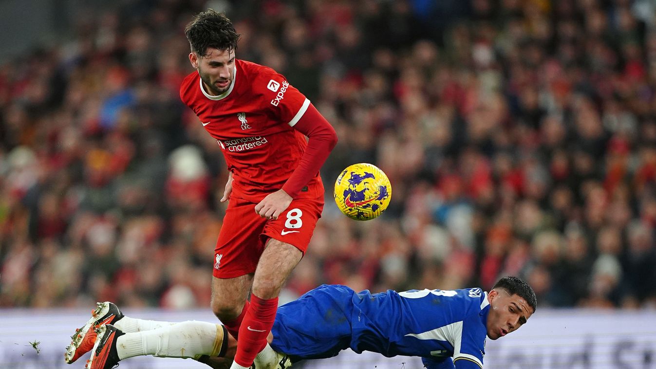Liverpool's Dominik Szoboszlai and Chelsea's Enzo Fernandez (right) battle for the ball during the Premier League match at Anfield, Liverpool. Picture date: Wednesday January 31, 2024. (Photo by Peter Byrne/PA Images via Getty Images)