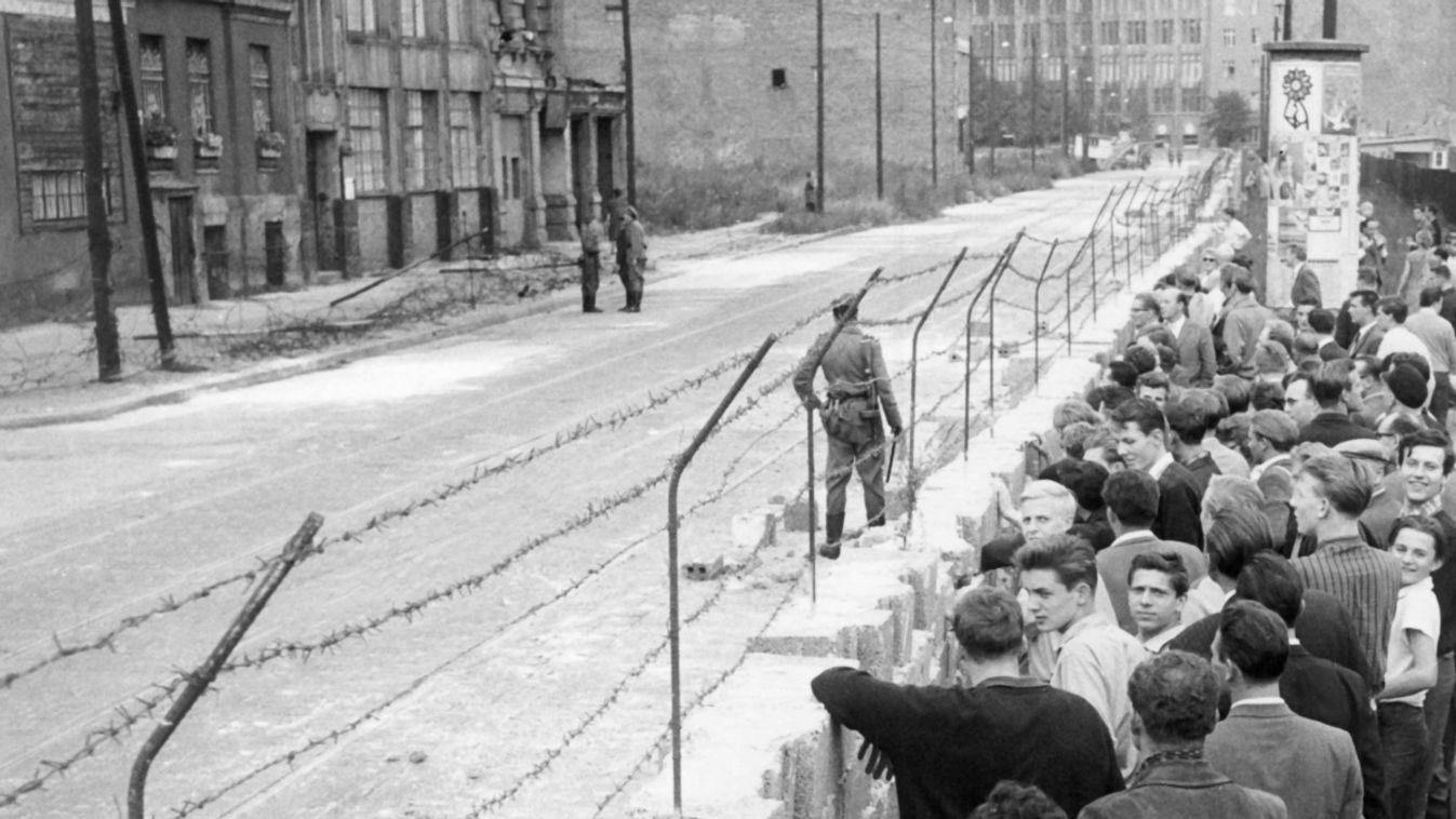 Citizens from West Berlin gather at newly erected Berlin Wall