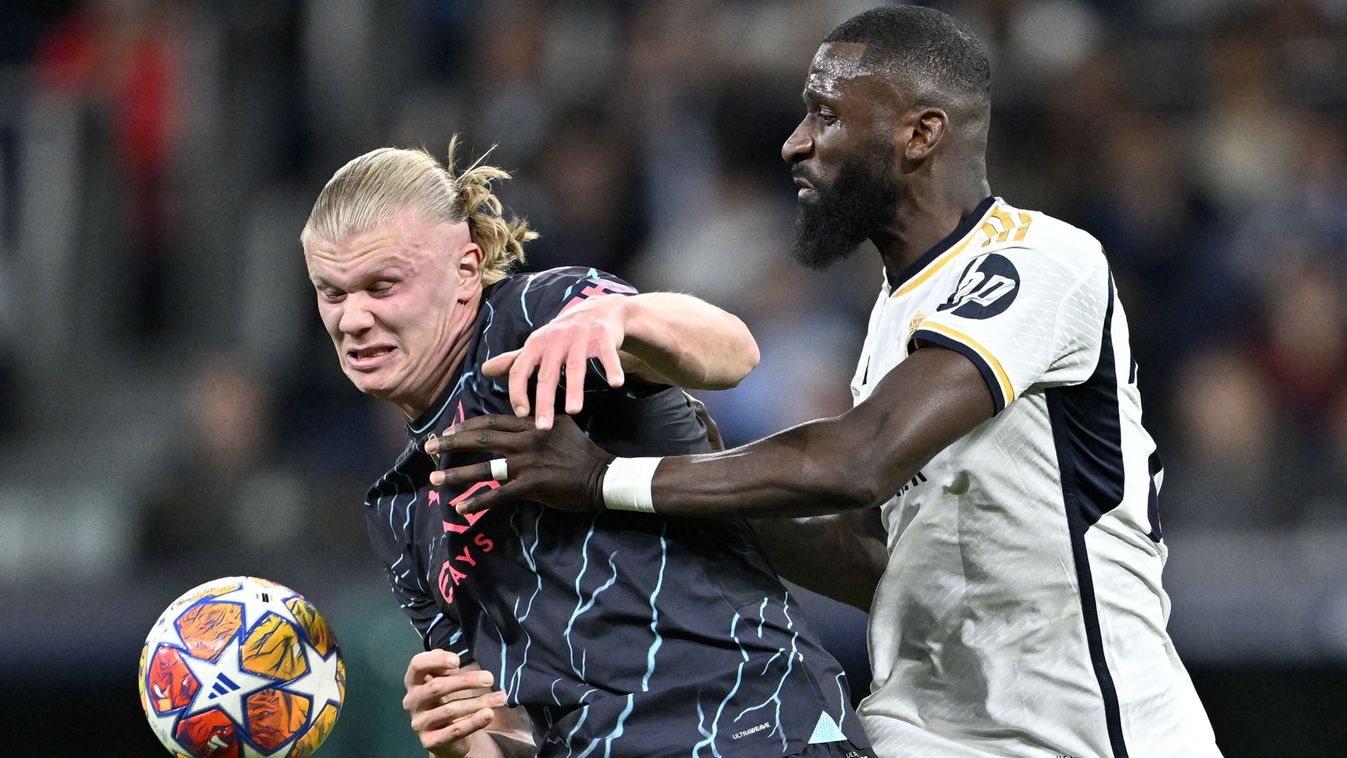 MADRID, SPAIN - APRIL 09: Antonio Rudiger (R) of Real Madrid in action against Erling Haaland (L) of Manchester City during the UEFA Champions League Quarter-Final match between Real Madrid and Manchester City at Santiago Bernabeu Stadium in Madrid, Spain on April 09, 2024. Burak Akbulut / Anadolu (Photo by BURAK AKBULUT / ANADOLU / Anadolu via AFP)