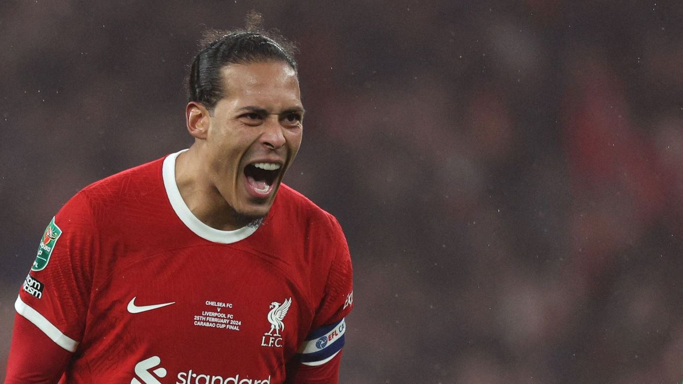Liverpool's Dutch defender #04 Virgil van Dijk celebrates on the pitch after the English League Cup final football match between Chelsea and Liverpool at Wembley stadium, in London, on February 25, 2024. Virgil van Dijk scored the only goal deep into extra-time as Liverpool won the League Cup for a record tenth time. 