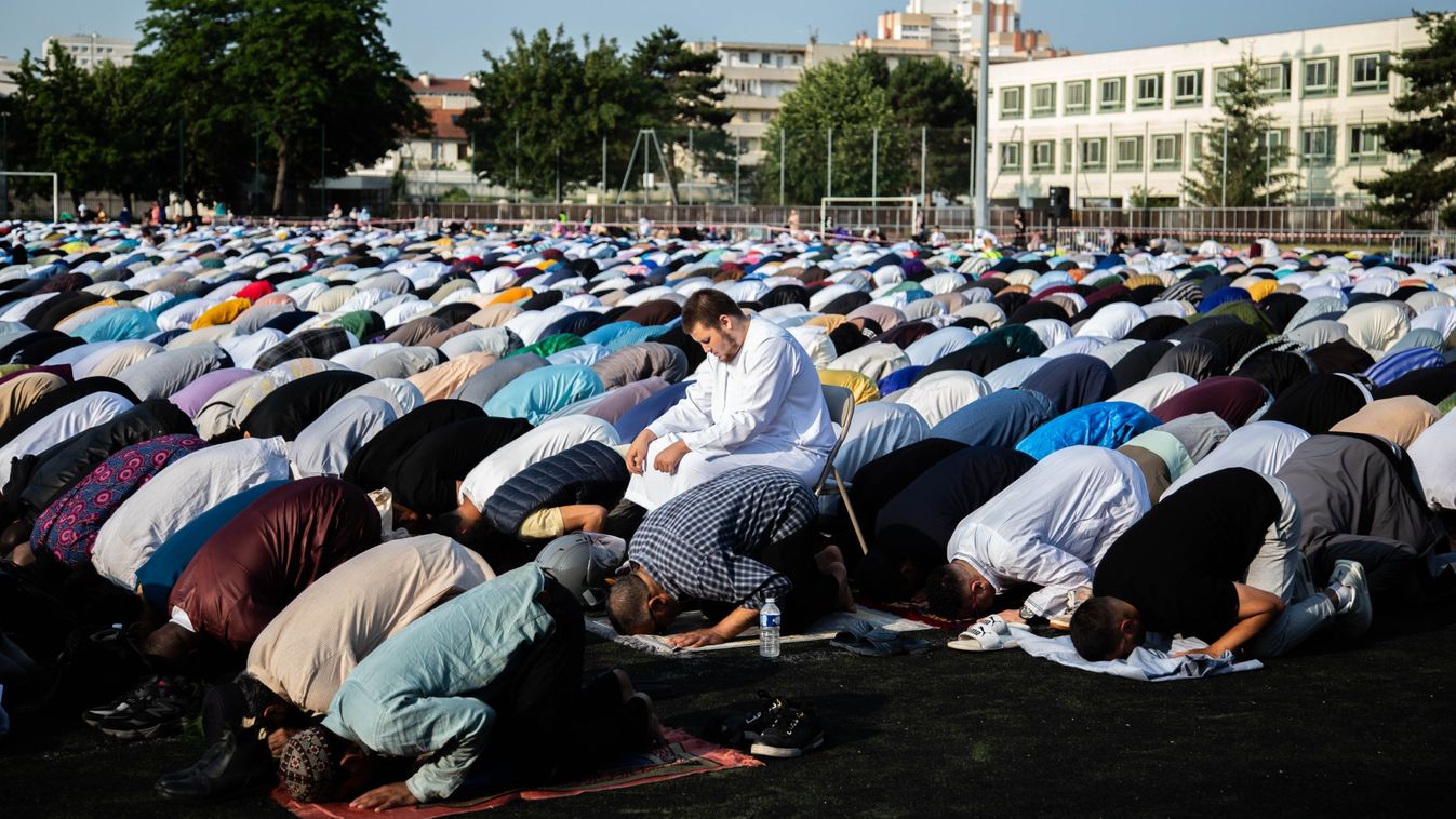 Muslim worshippers perform the morning prayers for Eid al-Adha in Paris, France on June 28, 2023. Known as the ''big'' festival, Eid al-Adha, or Feast of Sacrifice, is celebrated each year by Muslims sacrificing various animals according to religious traditions, including cows, camels, goats, and sheep. (Photo by Ibrahim Ezzat/NurPhoto via Getty Images)
