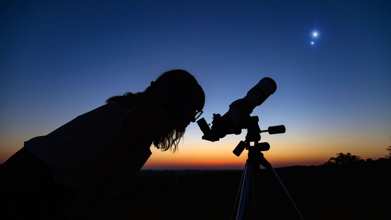 Woman,Looking,At,Night,Sky,With,Amateur,Astronomical,Telescope.