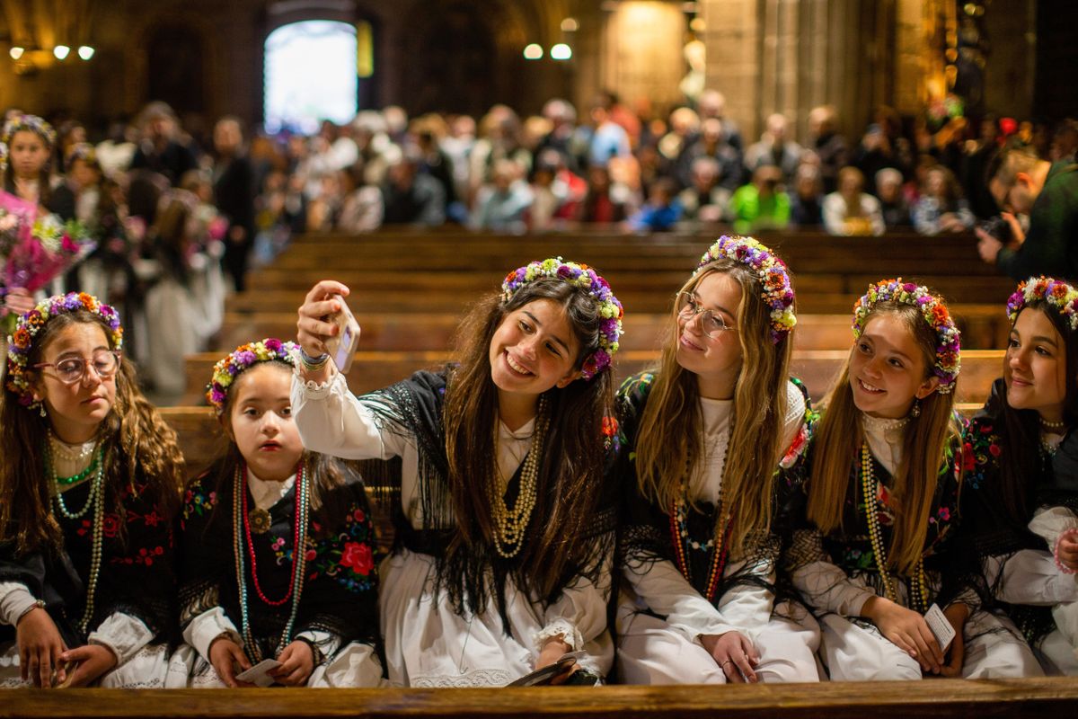 A group of girls dressed as "Mayas" take a selfie while