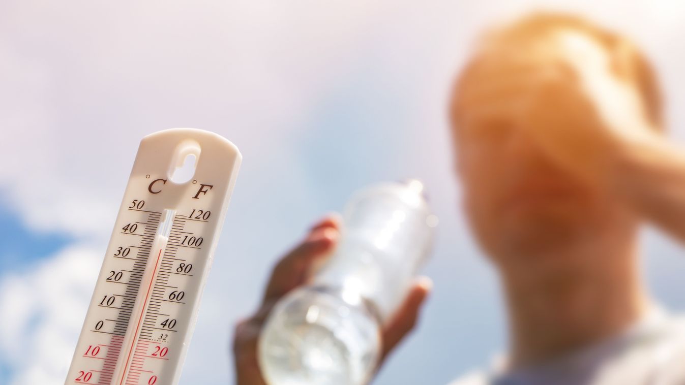 Man,Drinking,Water,In,Extreme,Heat,,Thermometer,In,Summer,Day