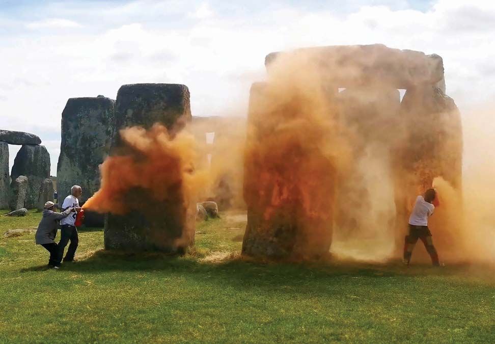 Two held after Stonehenge sprayed with orange substance: UK police