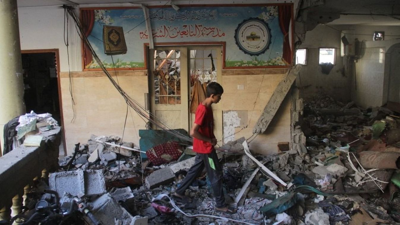 Israeli military kills at least 100 Palestinians in Gaza school bombing