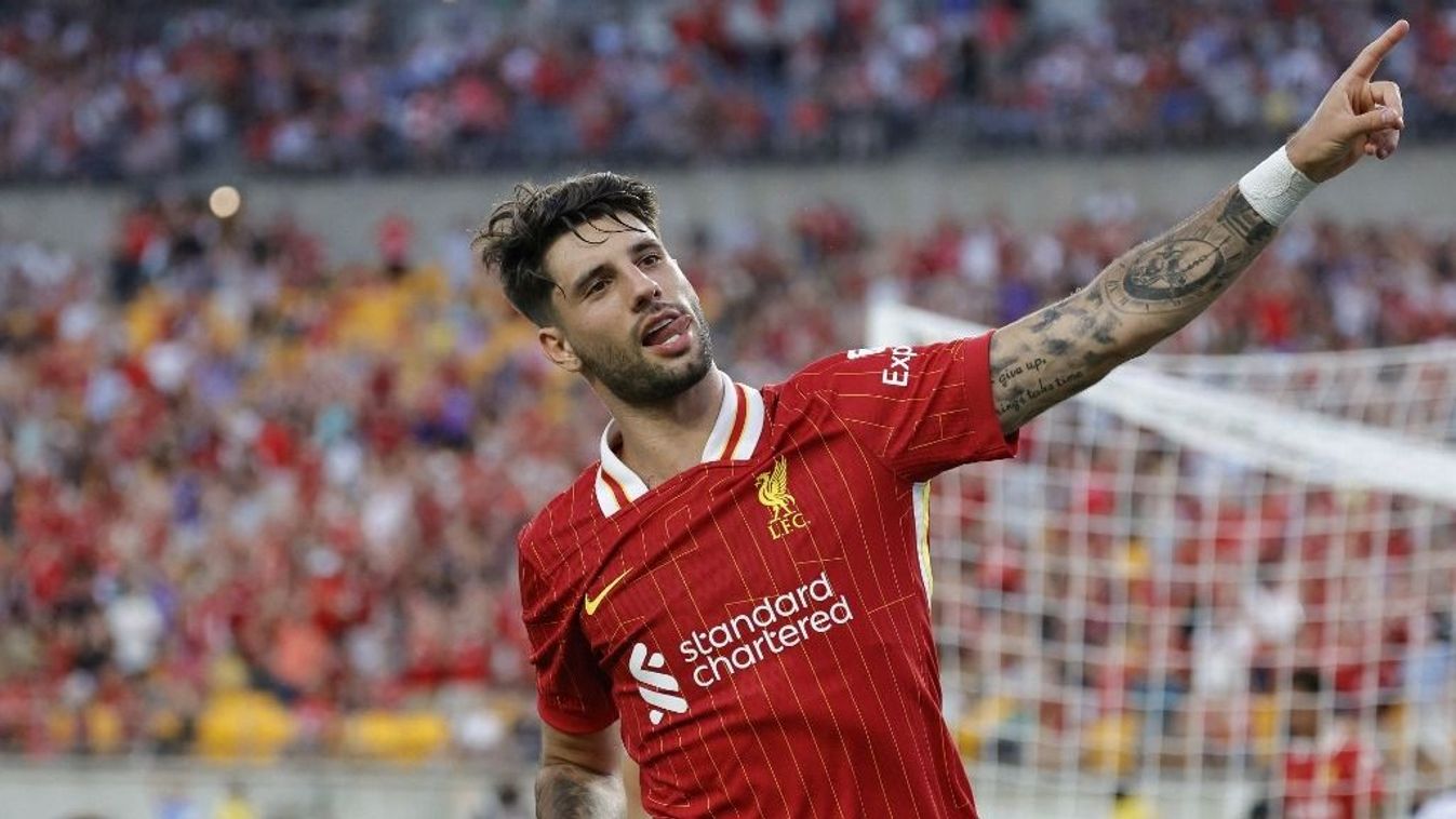 Liverpool's midfielder Dominik Szoboszlai celebrates after scoring a goal during a pre-season club friendly football match between Liverpool and Real Betis at Acrisure Stadium, in Pittsburgh, Pennsylvania, on July 26, 2024. 